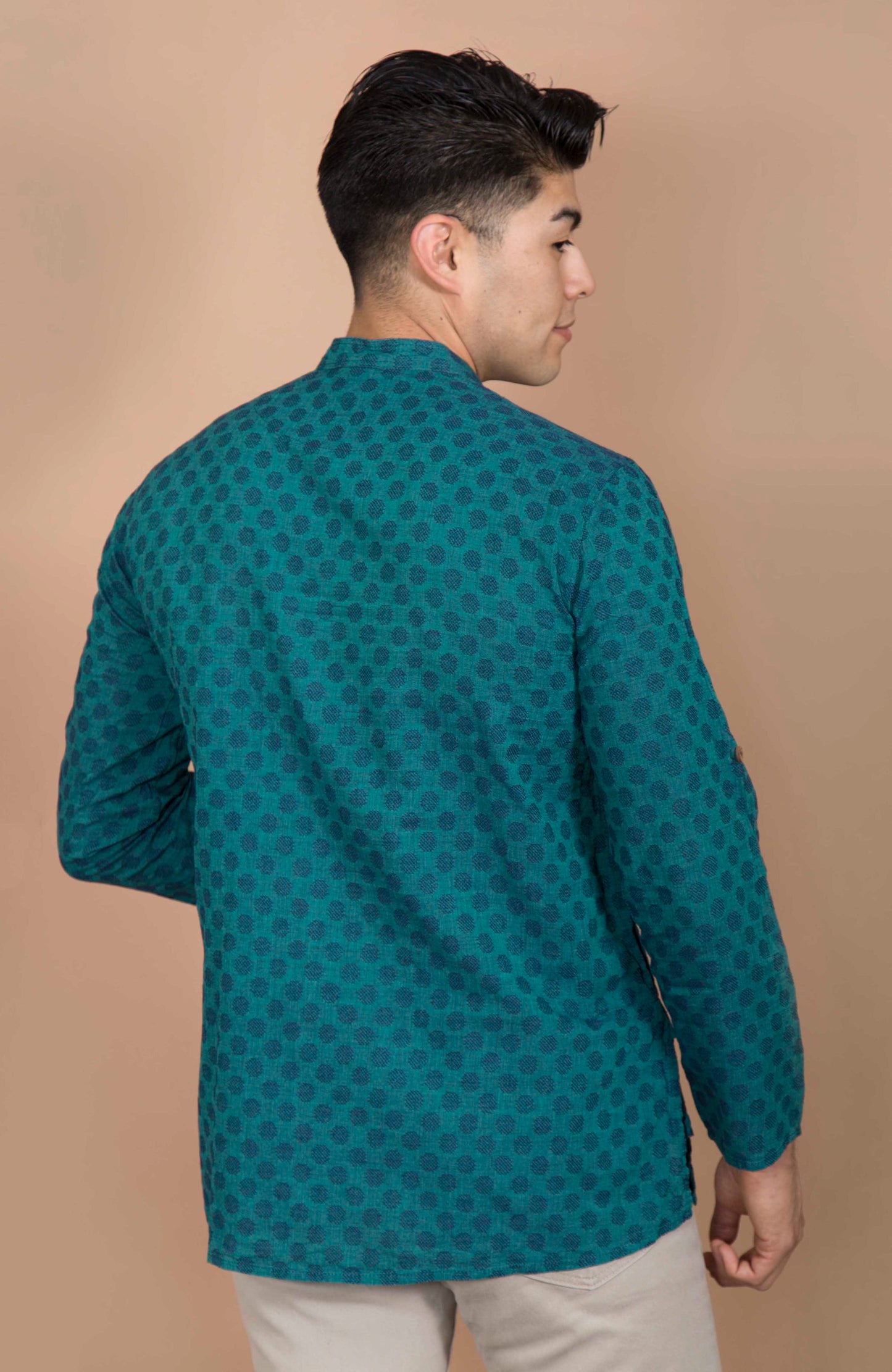 Teal Oval Pleasant & Serene The Teal Oval Kurta. This loose fitting and airy Kurta pairs well with some jeans or chinos and boots or sneakers. Long sleeves to be kept stretched out or rolled up in place with wooden buttons on the elbows to maintain that cool and casual vibe. 100% Cotton Chest and Side Pockets Regular Fit Made in India