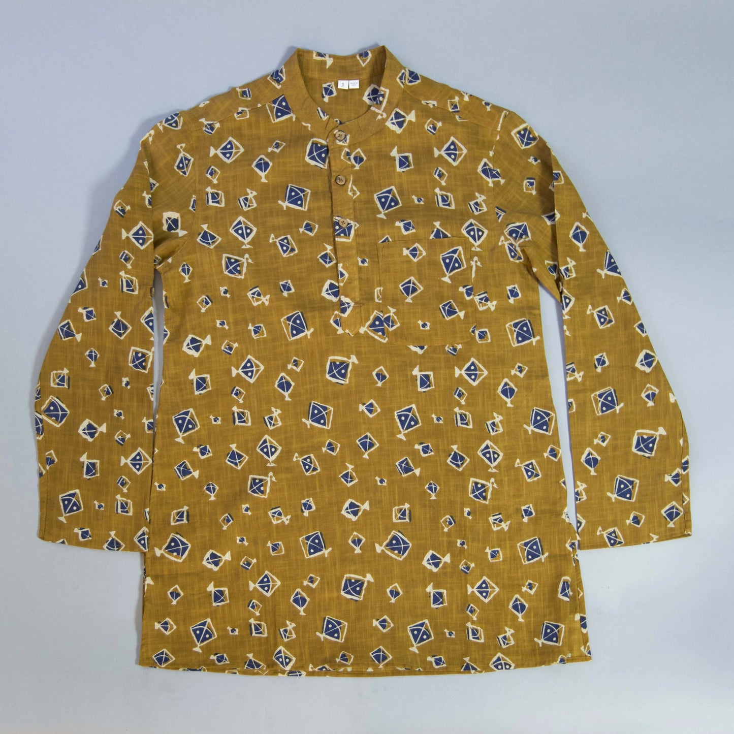 Kite Eccentric & Airy The Kite Kurta. This loose fitting and airy Kurta pairs well with some jeans or chinos and boots or sneakers. Long sleeves to be kept stretched out or rolled up in place with wooden buttons on the elbows to maintain that cool and casual vibe. 100% Cotton Chest and Side Pockets Regular Fit Made in India