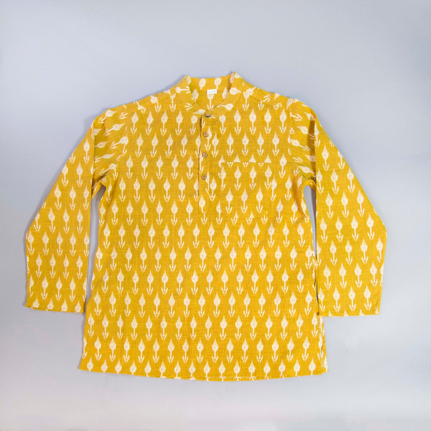 Wheat Crisp & Natural The Wheat Kurta. This loose fitting and airy Kurta pairs well with some jeans or chinos and boots or sneakers. Long sleeves to be kept stretched out or rolled up in place with wooden buttons on the elbows to maintain that cool and casual vibe. 100% Cotton Chest and Side Pockets Regular Fit Made in India