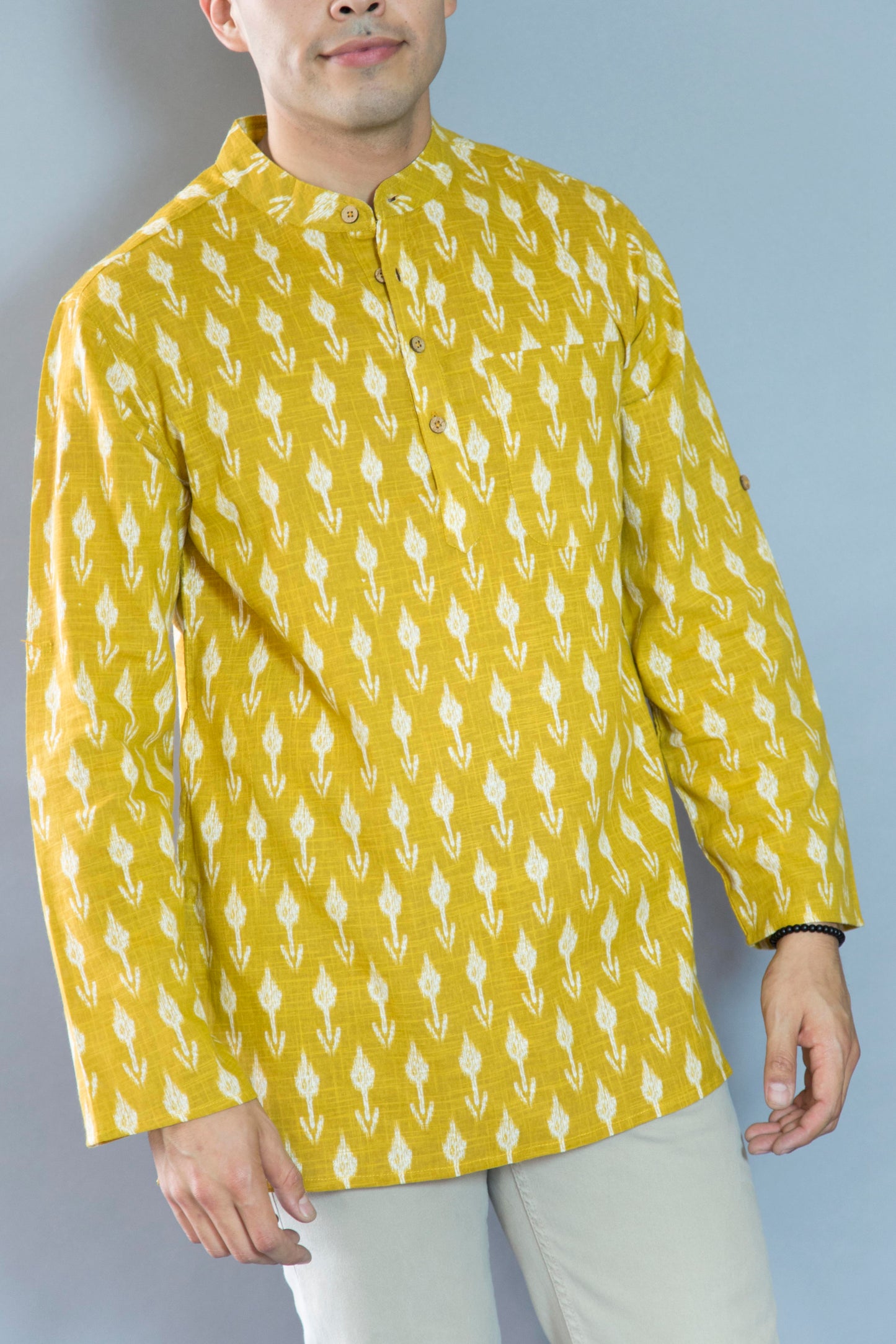 Wheat Crisp & Natural The Wheat Kurta. This loose fitting and airy Kurta pairs well with some jeans or chinos and boots or sneakers. Long sleeves to be kept stretched out or rolled up in place with wooden buttons on the elbows to maintain that cool and casual vibe. 100% Cotton Chest and Side Pockets Regular Fit Made in India