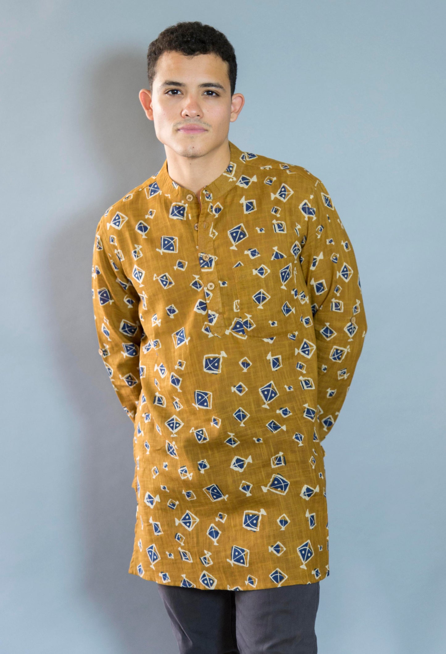 Kite Eccentric & Airy The Kite Kurta. This loose fitting and airy Kurta pairs well with some jeans or chinos and boots or sneakers. Long sleeves to be kept stretched out or rolled up in place with wooden buttons on the elbows to maintain that cool and casual vibe. 100% Cotton Chest and Side Pockets Regular Fit Made in India