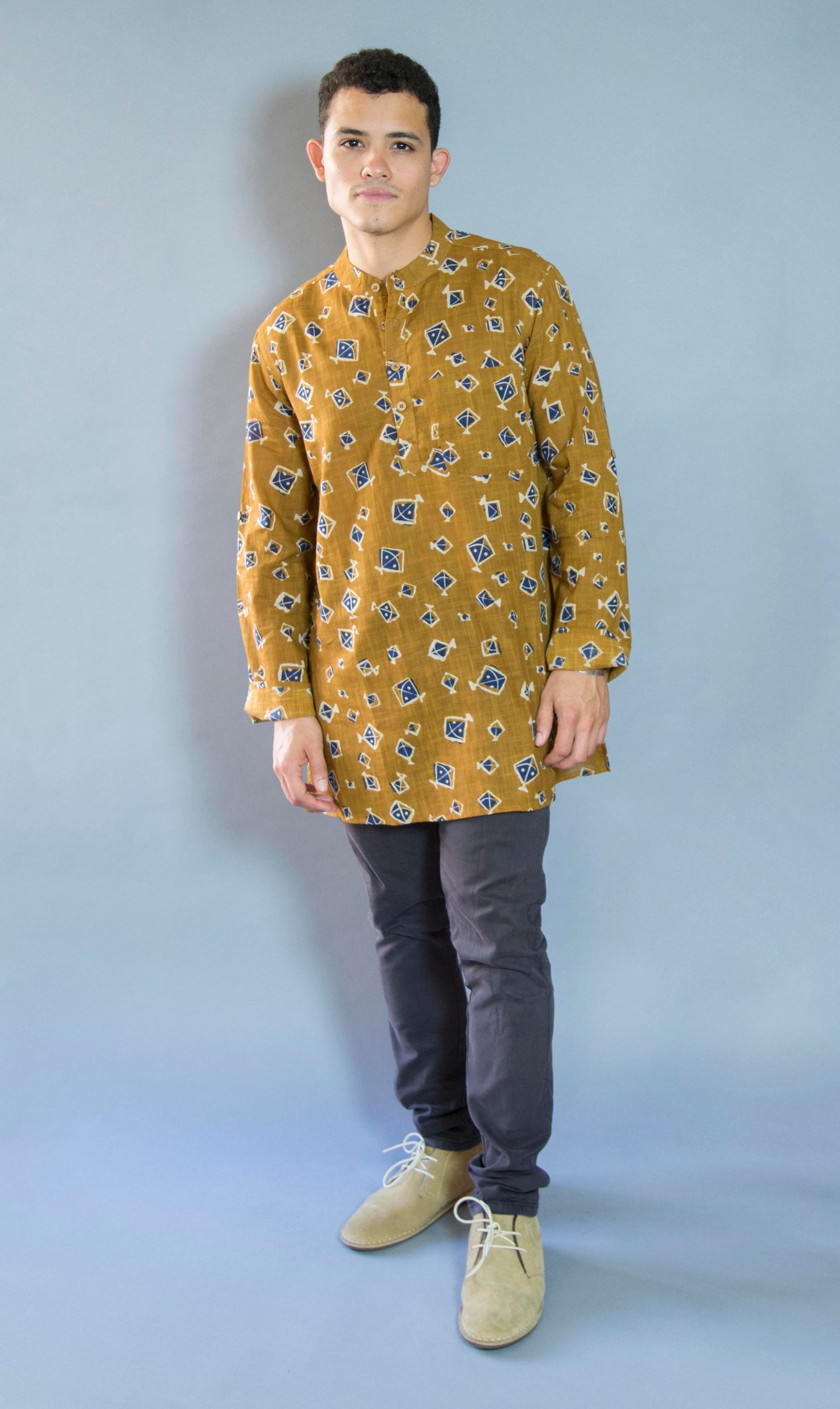 Kite Eccentric & Airy The Kite Kurta. This loose fitting and airy Kurta pairs well with some jeans or chinos and boots or sneakers. Long sleeves to be kept stretched out or rolled up in place with wooden buttons on the elbows to maintain that cool and casual vibe. 100% Cotton Chest and Side Pockets Regular Fit Made in India