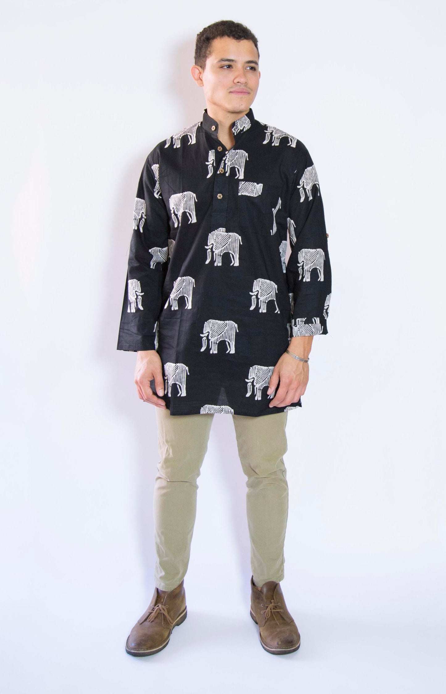 Elephant Bone Wild & Free The Elephant Bone Kurta. This loose fitting and airy Kurta pairs well with some jeans or chinos and boots or sneakers. Long sleeves to be kept stretched out or rolled up in place with wooden buttons on the elbows to maintain that cool and casual vibe. 100% Cotton Chest and Side Pockets Regular Fit Made in India