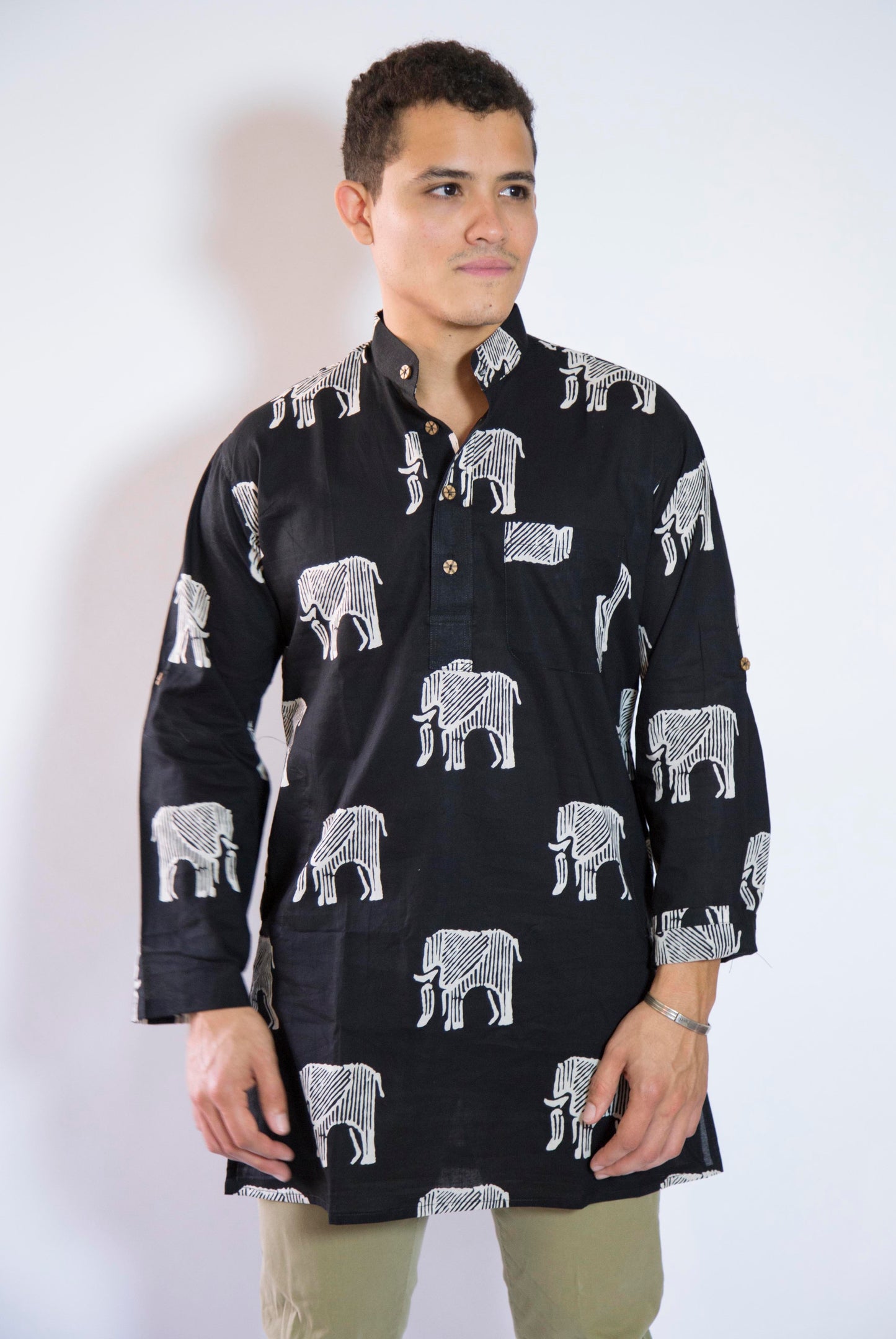 Elephant Bone Wild & Free The Elephant Bone Kurta. This loose fitting and airy Kurta pairs well with some jeans or chinos and boots or sneakers. Long sleeves to be kept stretched out or rolled up in place with wooden buttons on the elbows to maintain that cool and casual vibe. 100% Cotton Chest and Side Pockets Regular Fit Made in India