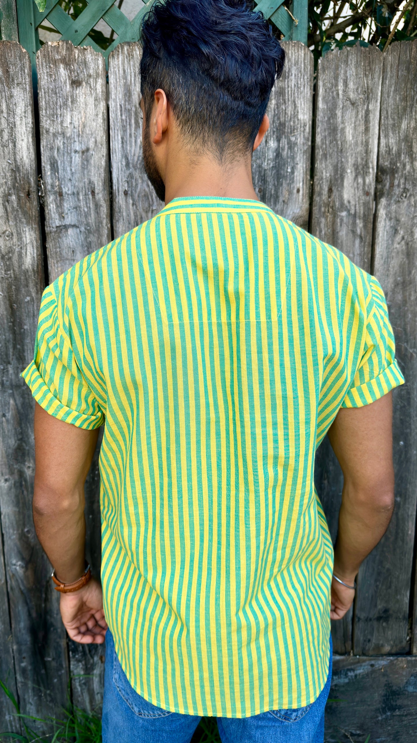 Vasant (Spring) Kurta Band Collar Men's Shirts Quarter Button Cotton. Showcasing the signature South Asian Band Collar neck coupled with coconut button enclosures; The Kurta effortlessly blends Eastern aesthetics with Western style. Quarter button, green & turquoise stripes. A shirt designed to be a South Asian inspired elevated casual cotton shirt. 