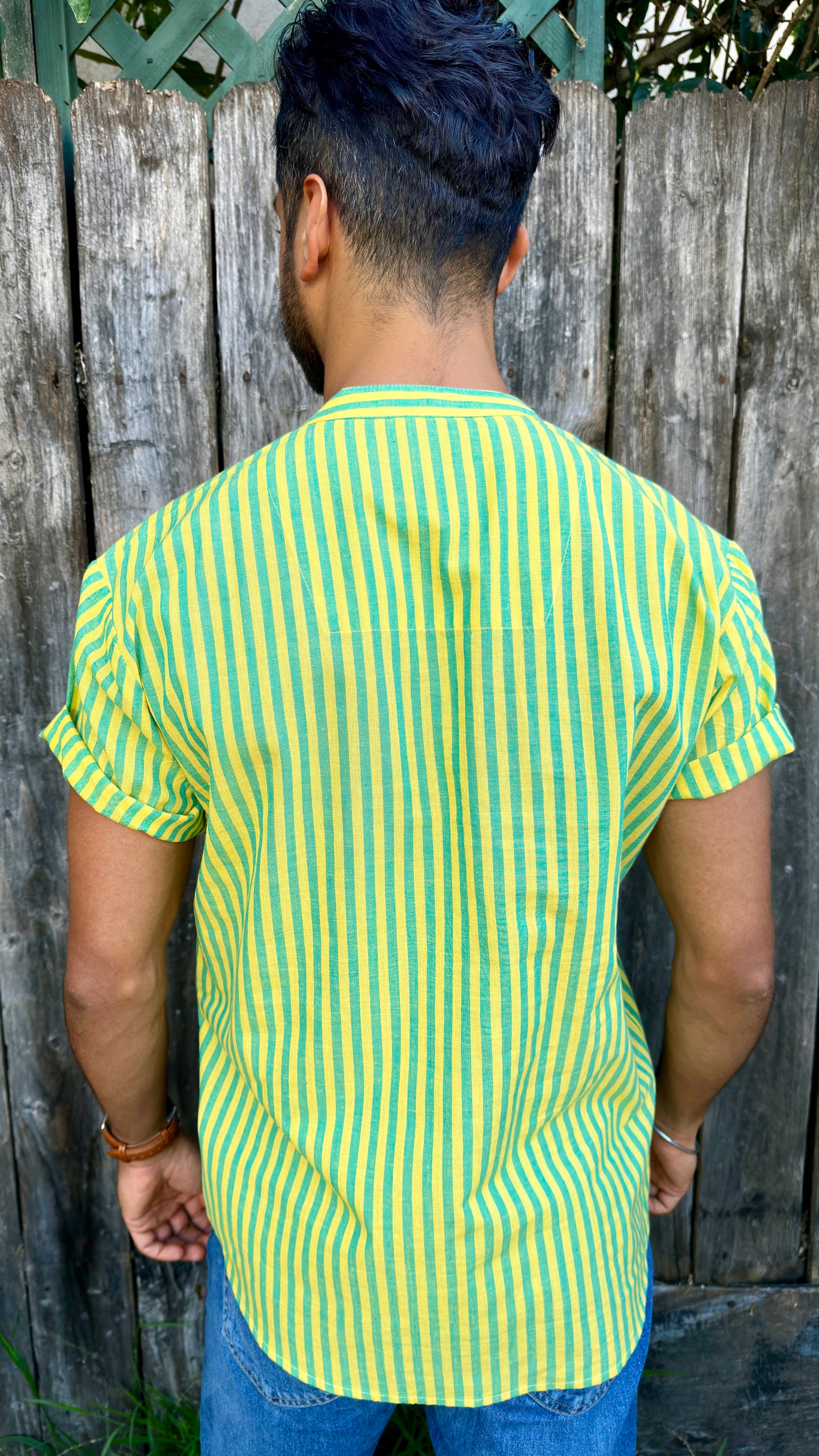 Vasant (Spring) Kurta Band Collar Men's Shirts Quarter Button Cotton. Showcasing the signature South Asian Band Collar neck coupled with coconut button enclosures; The Kurta effortlessly blends Eastern aesthetics with Western style. Quarter button, green & turquoise stripes. A shirt designed to be a South Asian inspired elevated casual cotton shirt. 