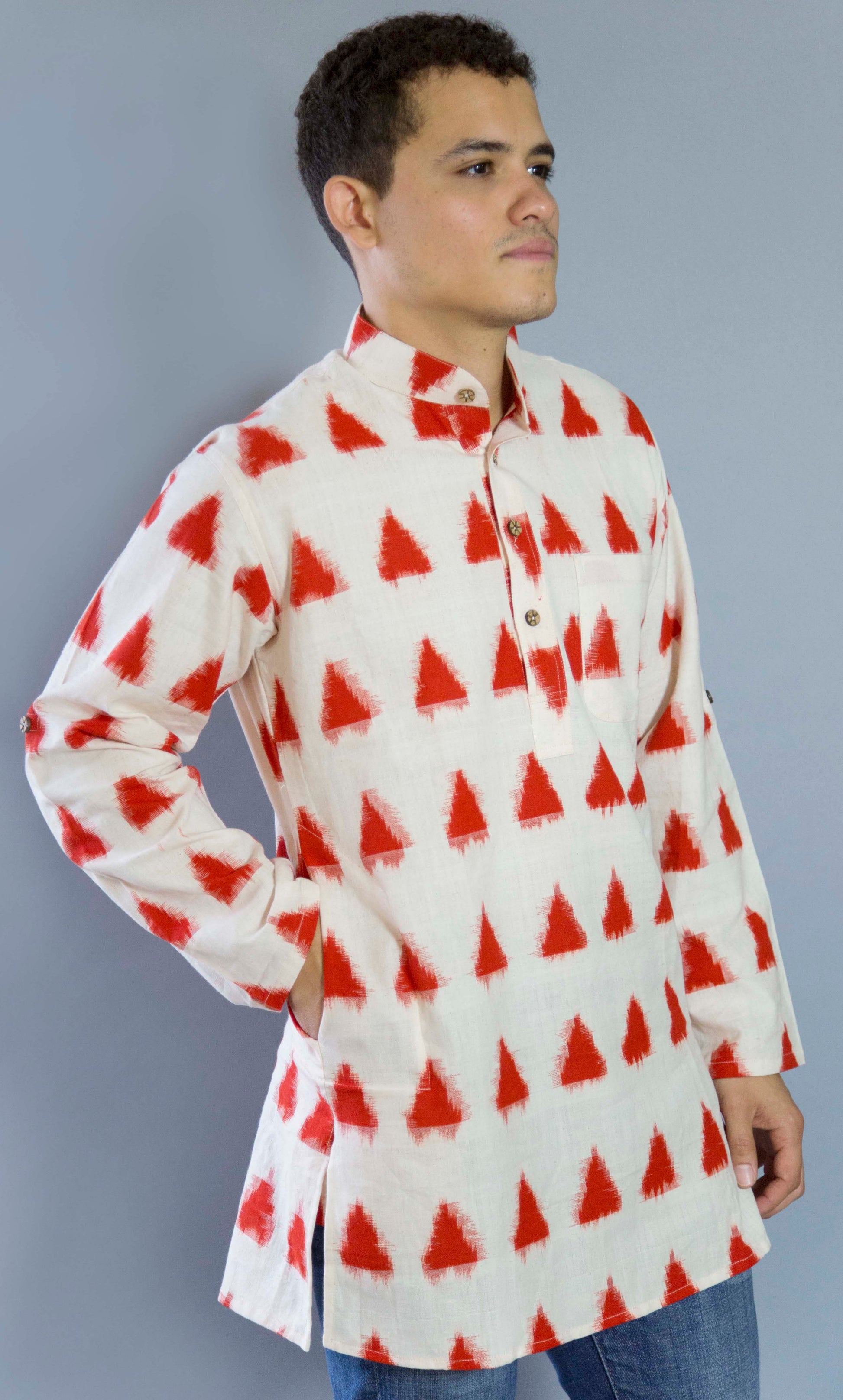 Ekaat Red Strong & Nomadic The Ekaat Red Kurta. This loose fitting and airy Kurta pairs well with some jeans or chinos and boots or sneakers. Long sleeves to be kept stretched out or rolled up in place with wooden buttons on the elbows to maintain that cool and casual vibe.   100% Cotton  Chest and Side Pockets  Regular Fit Made in India