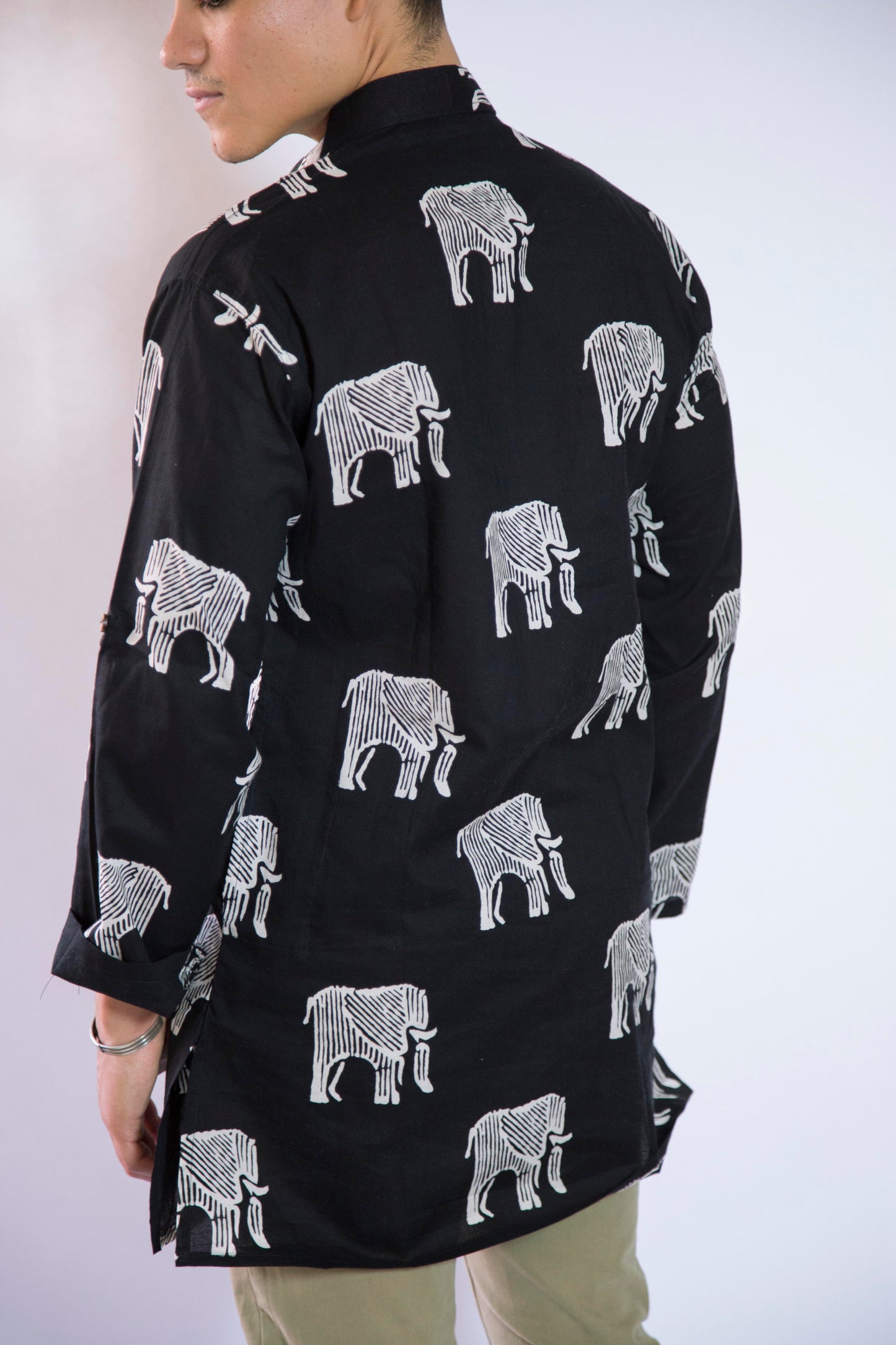Elephant Bone Wild & Free The Elephant Bone Kurta. This loose fitting and airy Kurta pairs well with some jeans or chinos and boots or sneakers. Long sleeves to be kept stretched out or rolled up in place with wooden buttons on the elbows to maintain that cool and casual vibe.   100% Cotton  Chest and Side Pockets  Regular Fit Made in India